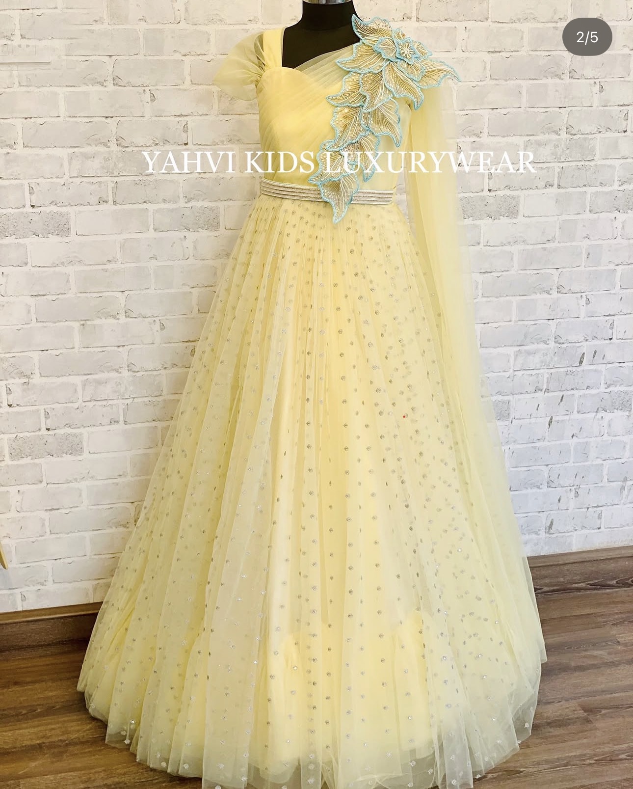 A designer pastel yellow gown - Image 2
